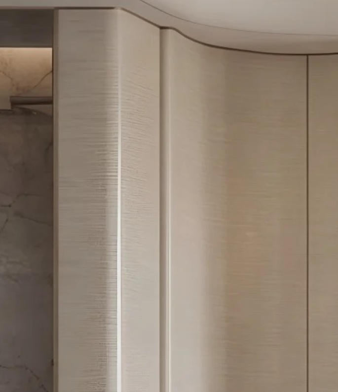 Curved timber feature panel beside the dressing vanity