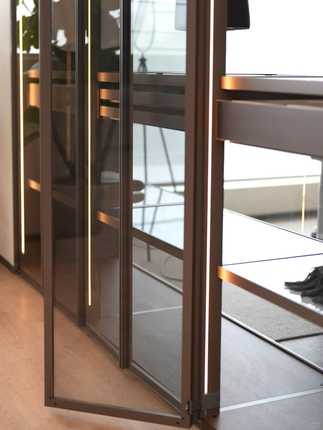 Illuminated glass wardrobe door with slim aluminium frame