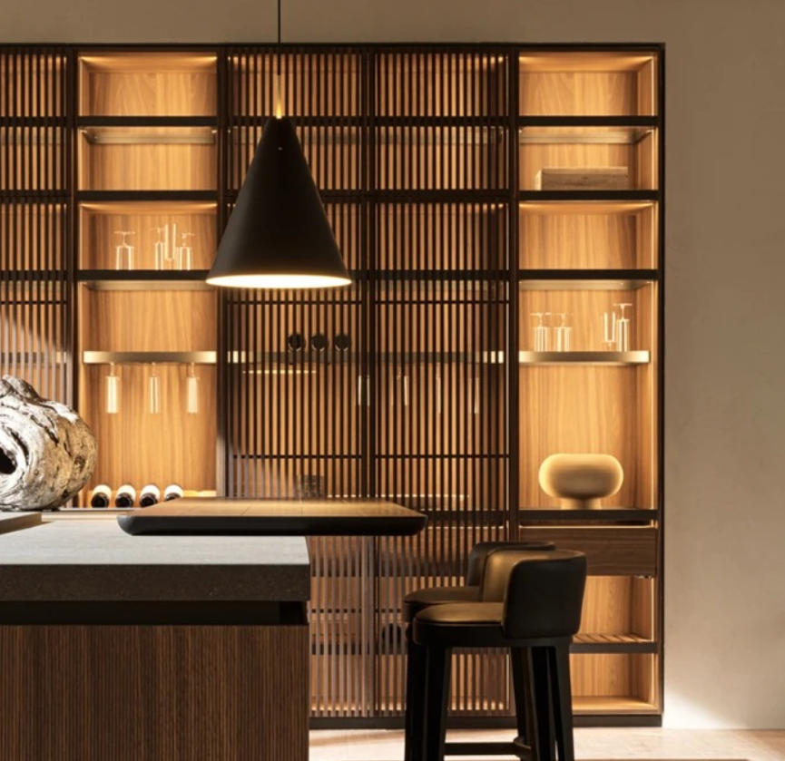 Wood veneer and fluted glass door in the social kitchen